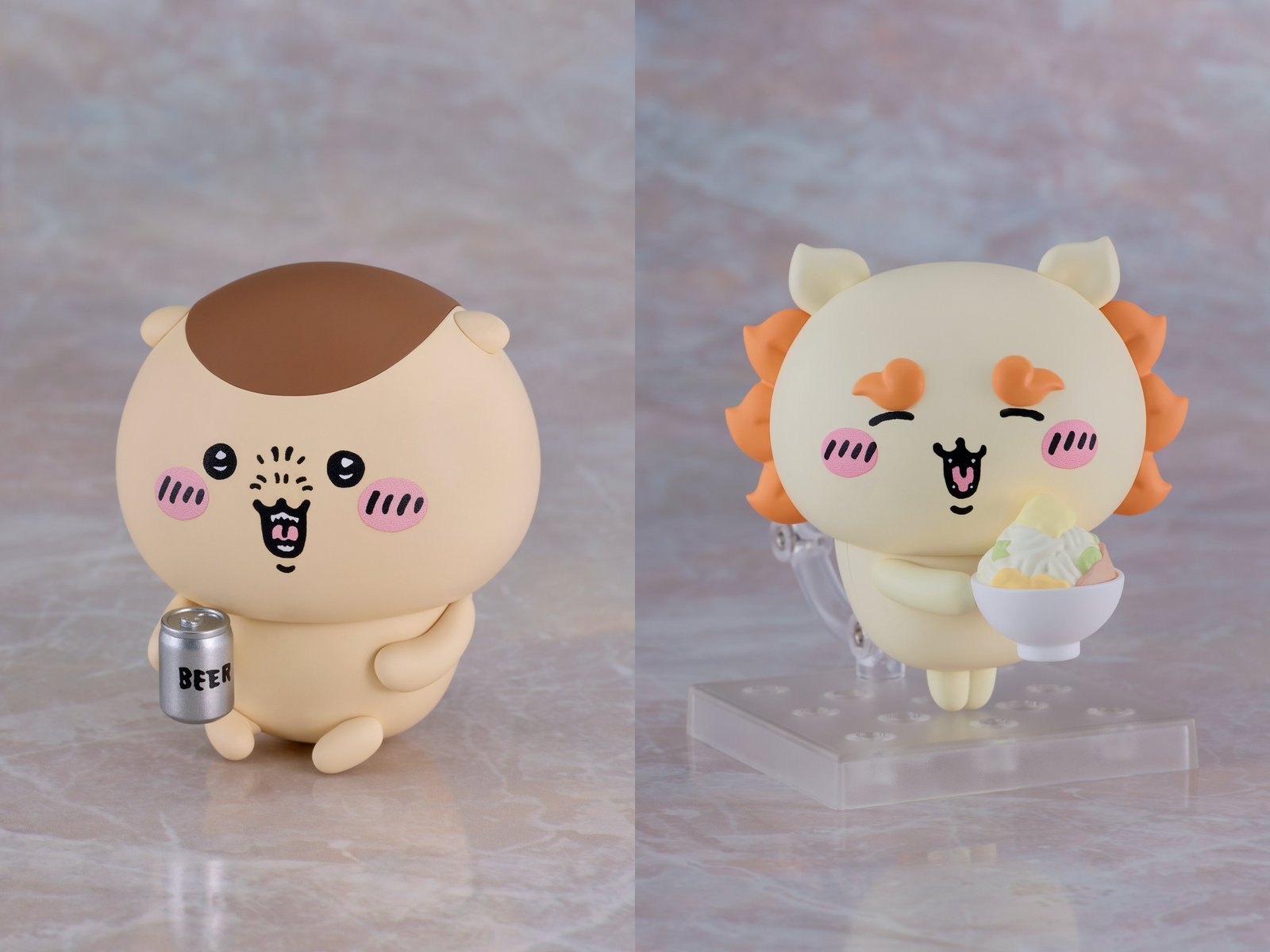 ねんどろいど くりまんじゅうとシーサーの公式画像。缶を持ったくりまんじゅうと、器を抱えたシーサーが並んでいる